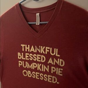 Short sleeve T shirt. “THANKFUL BLESSED AND PUMPKIN PIE OBSESSED”.  Sz lg